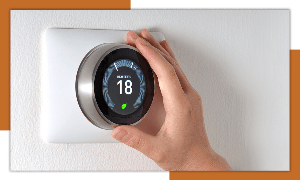 An image of a smart thermostat inside of a home.